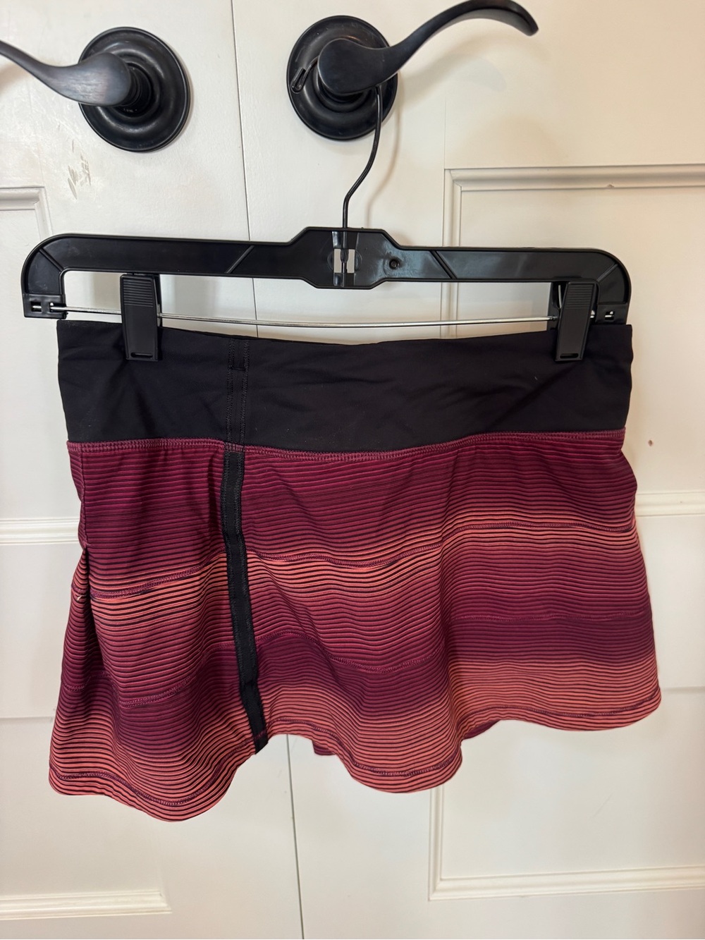 Lululemon multi color tennis skirt. Gradient Berry Stripes and Black Waistband